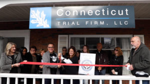 Claggett, Sykes & Garza members cutting the inaugural ribbon