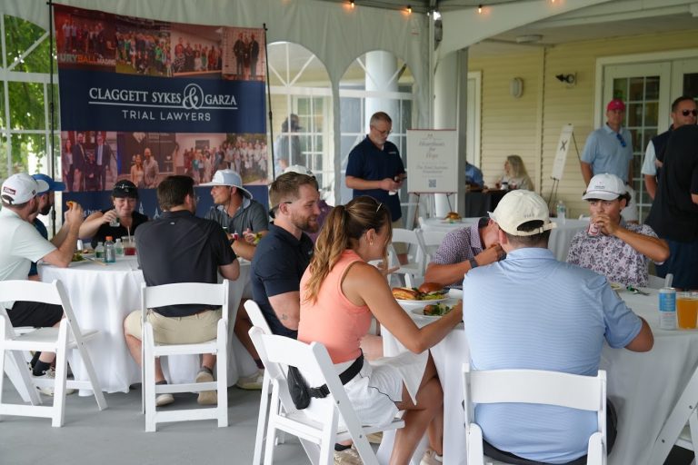 Guests gather at the clubhouse during the Quintero Classic