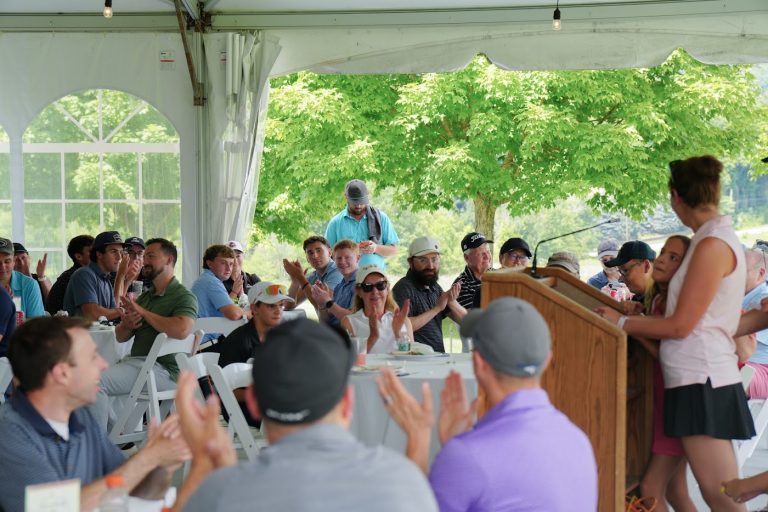 Guests gathered under the tent at the Quintero Classic