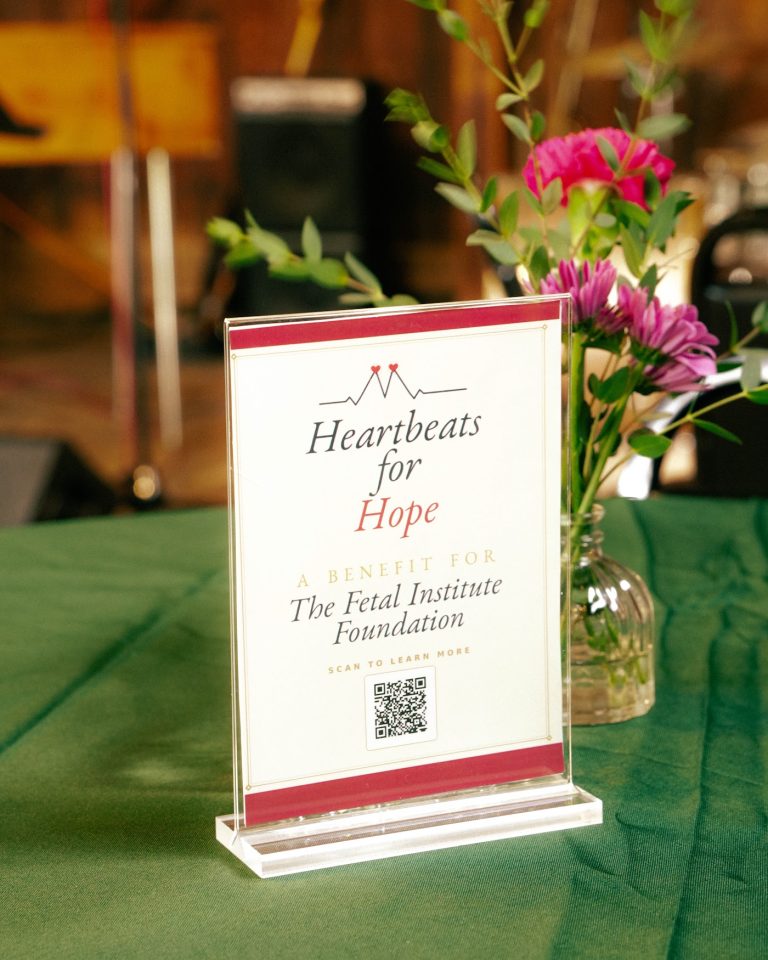 Heartbeats for Hope signage at An Evening with Zac Clark and Friends