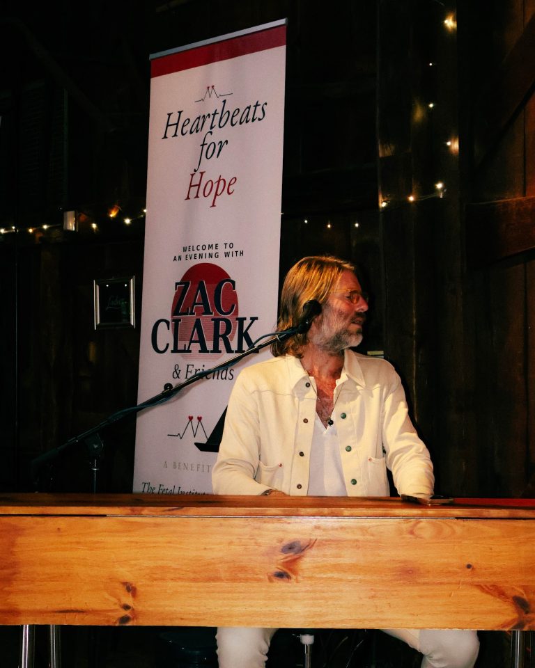 Heartbeats for Hope stage backdrop at An Evening with Zac Clark and Friends