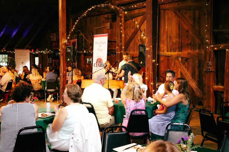 Guests seated for dinner at An Evening with Zac Clark and Friends